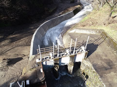 大谷第二発電所 土路川堰堤本復旧工事(水害)のうち 土路川堰堤下流護岸他復旧工事(JV工事)